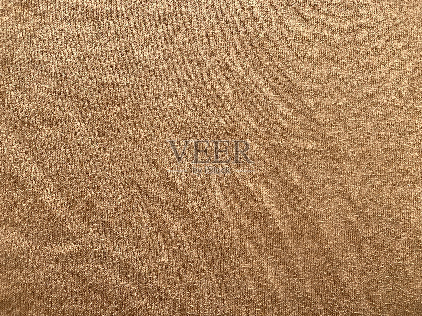 使用棕色织物纹理作为背景照片摄影图片