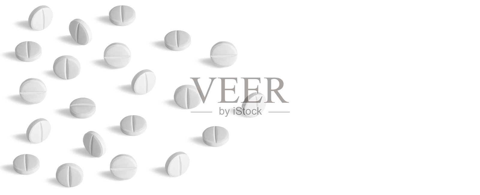 白色的哑光药片或药片在孤立的背景上成排地竖立着照片摄影图片