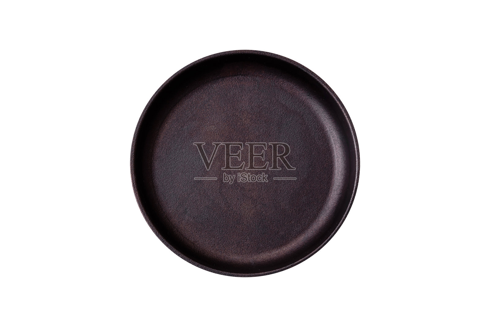 黑色混凝土背景上的棕色铁空锅和厨房用具照片摄影图片