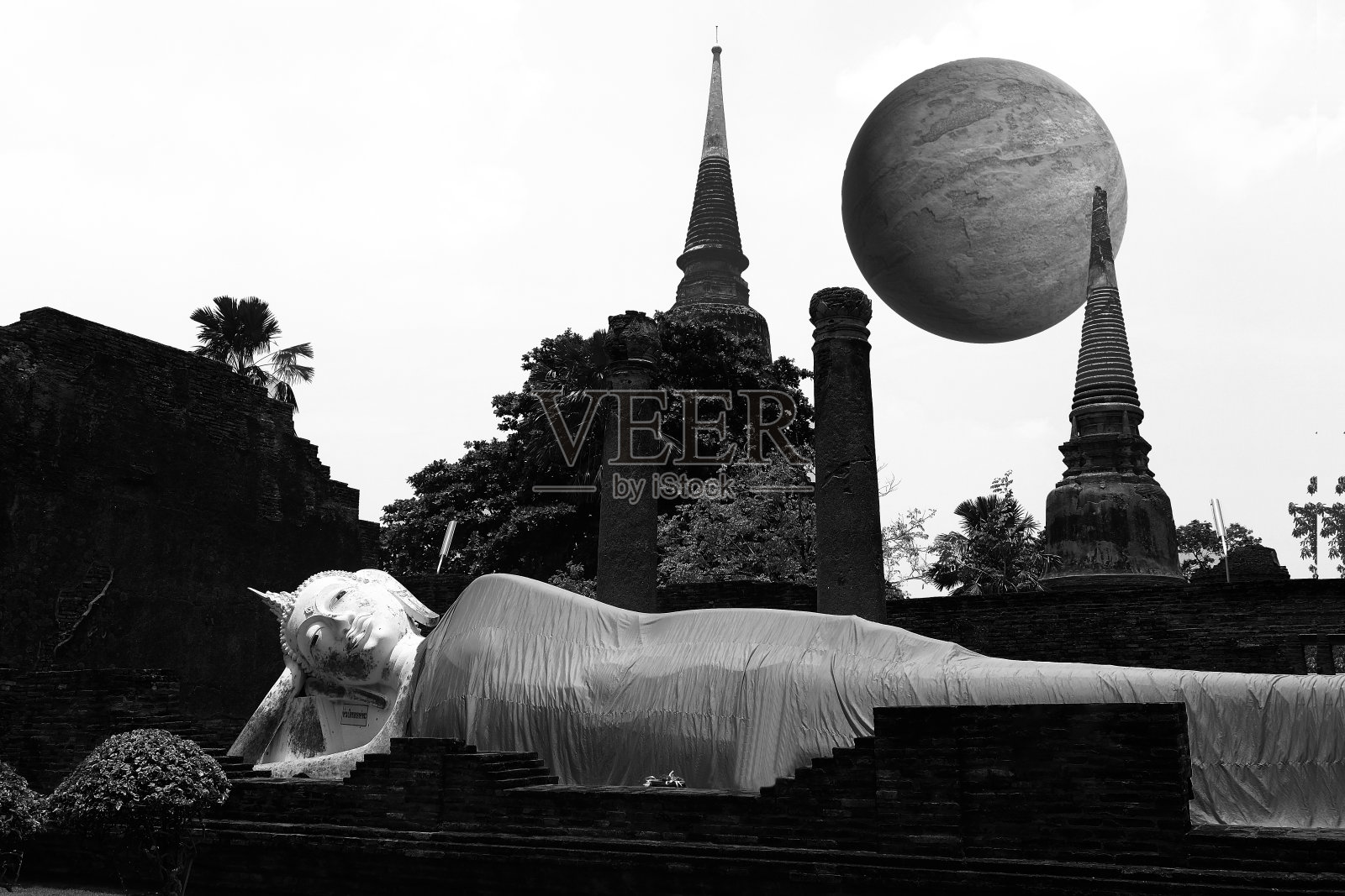 古代卧佛与满月背景照片摄影图片