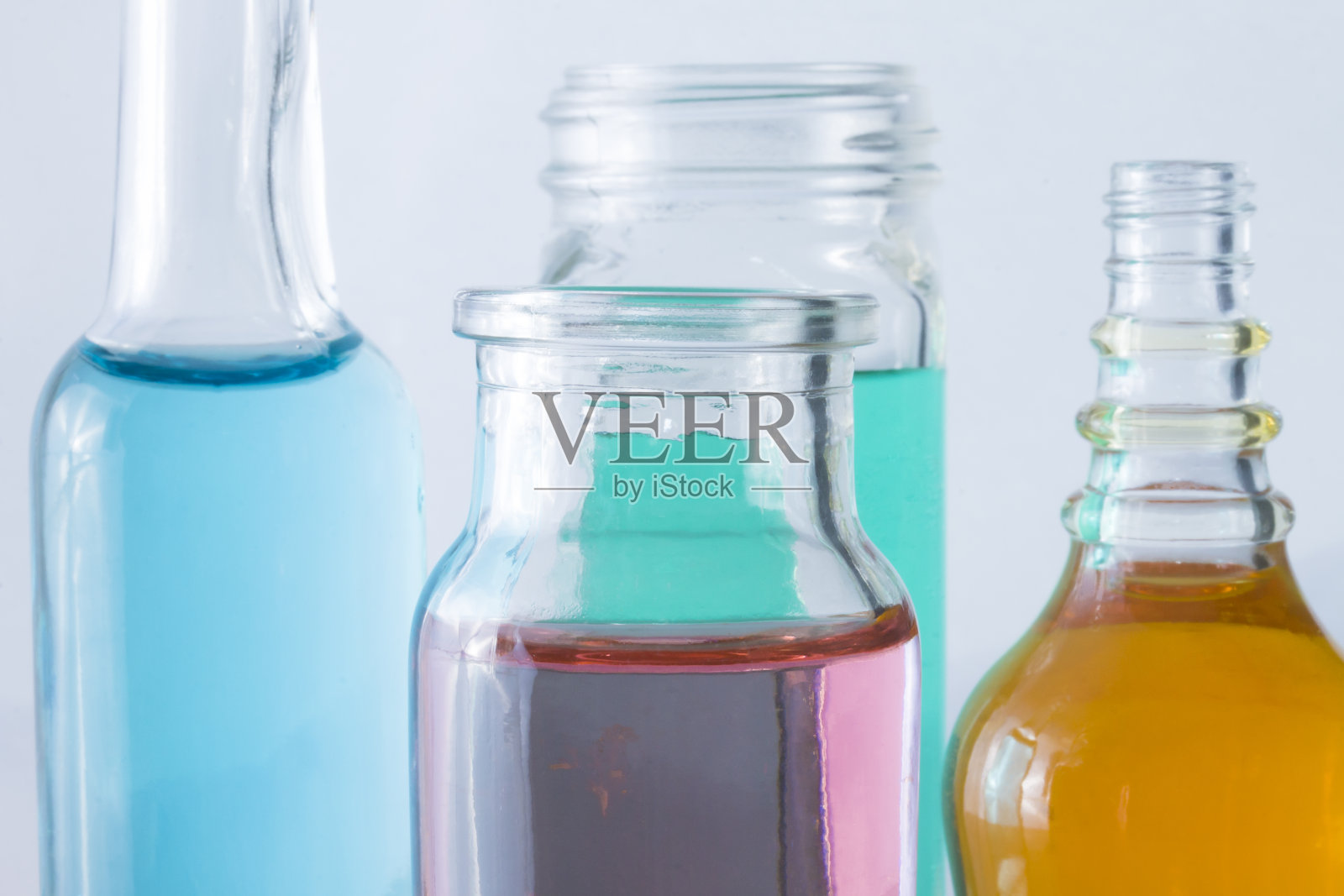 彩色液体玻璃瓶照片摄影图片