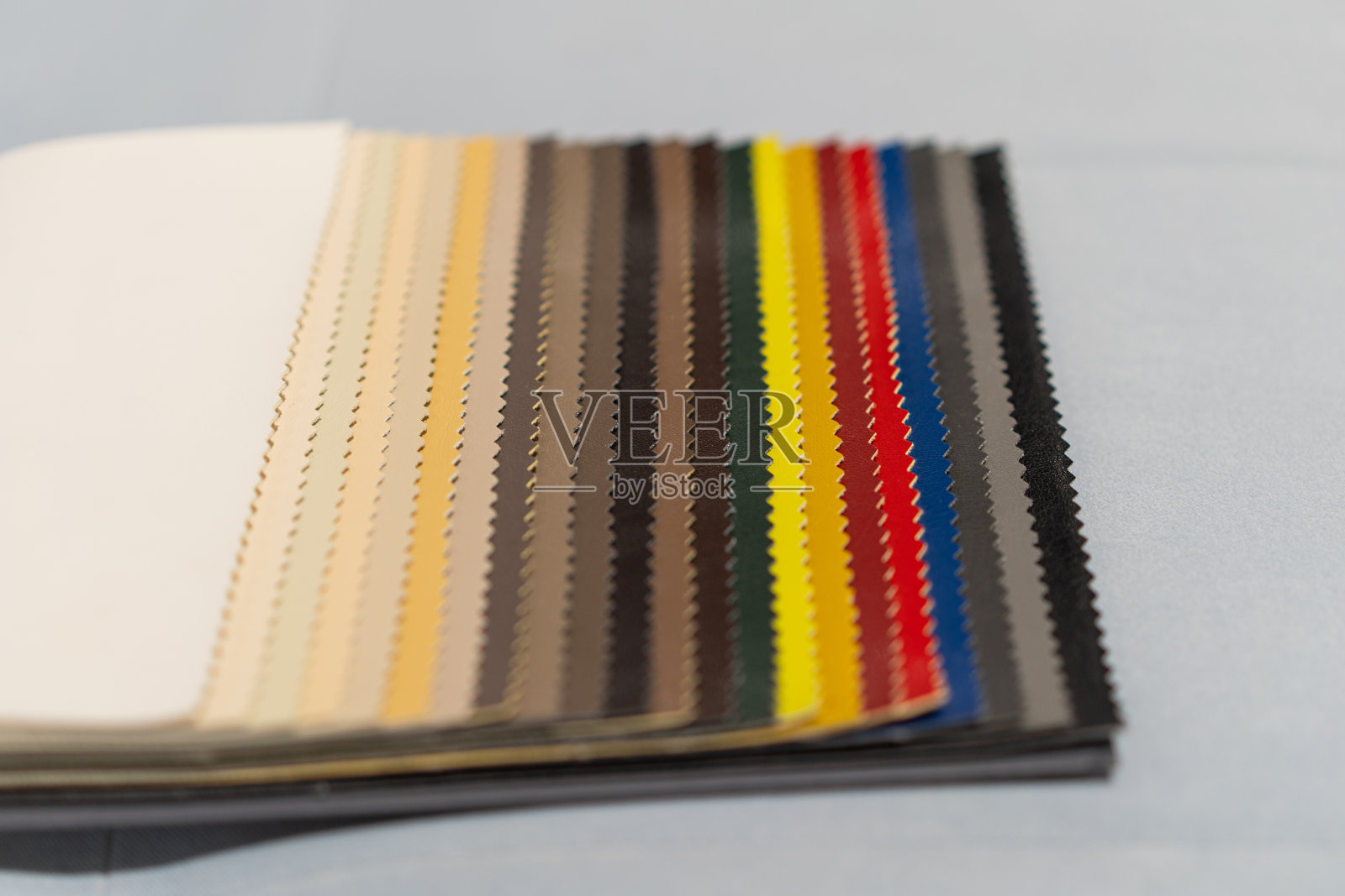 从消光织物纹理背景的多色仿皮革目录照片摄影图片