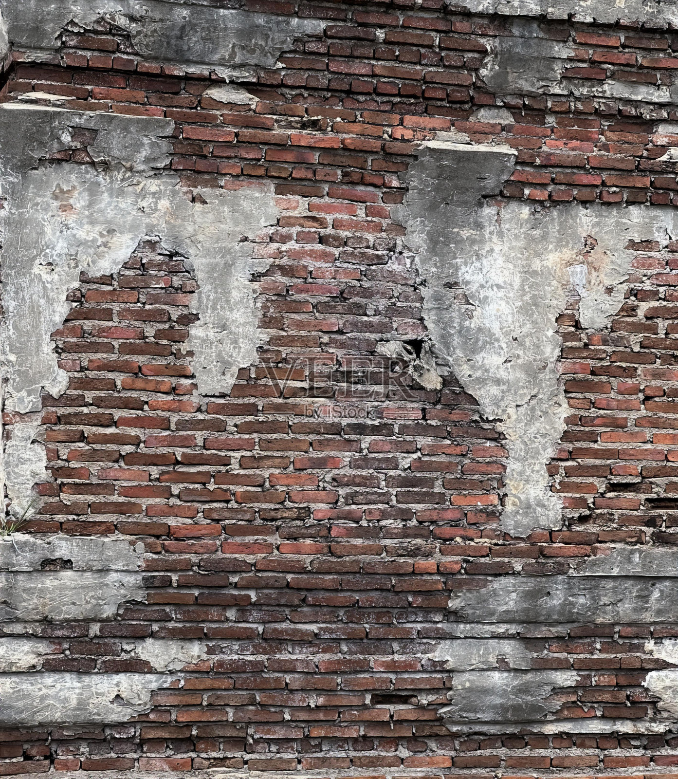 油漆剥落的墙壁。照片摄影图片