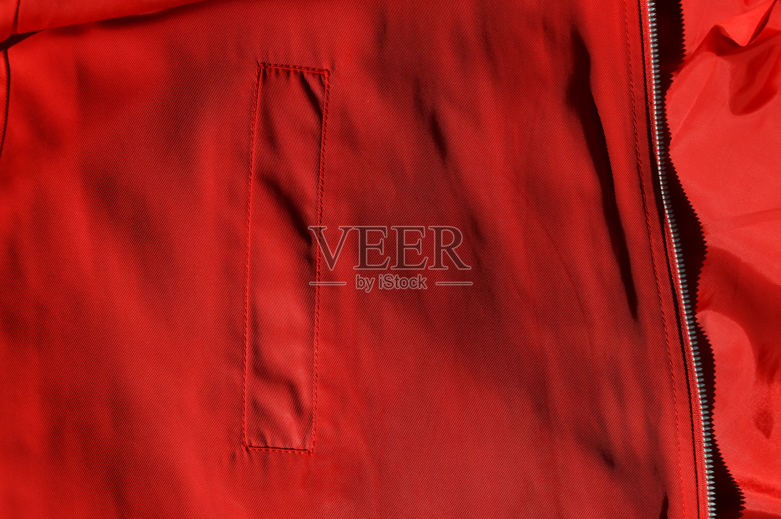 设计背景。棉质面料质地，夹克口袋。现代的衣服。缝纫用配件。照片摄影图片