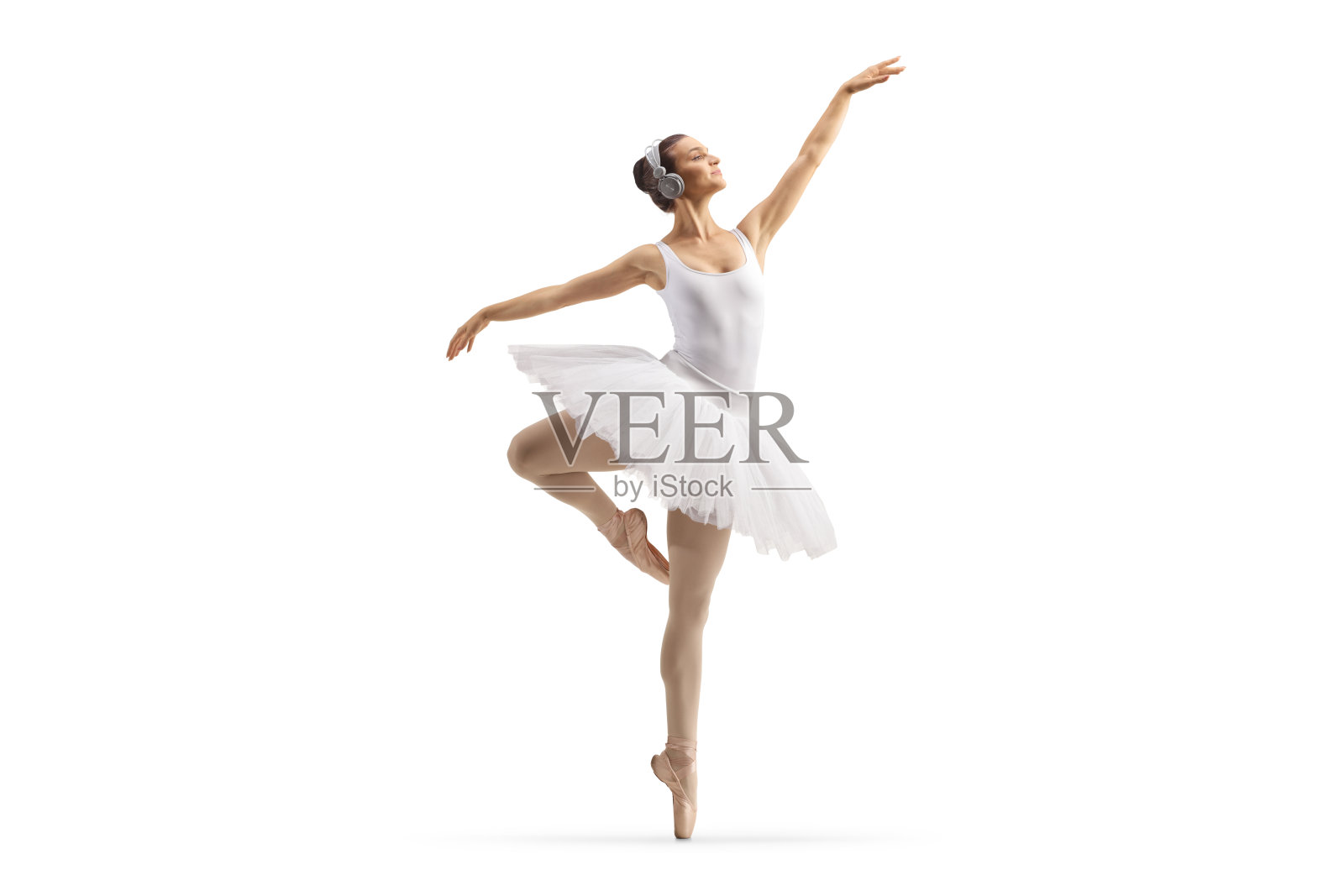 一个戴着耳机的芭蕾舞者的全身镜头照片摄影图片