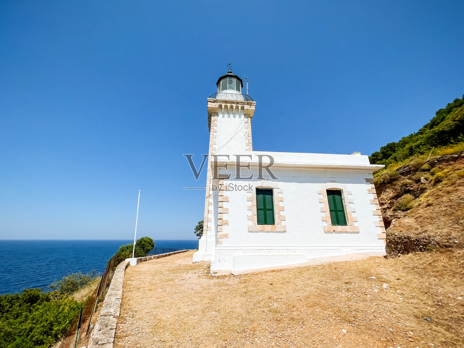 希腊斯科佩洛斯岛上的Gourouni灯塔照片摄影图片