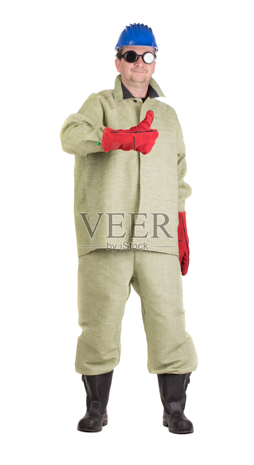 焊工竖起大拇指。照片摄影图片