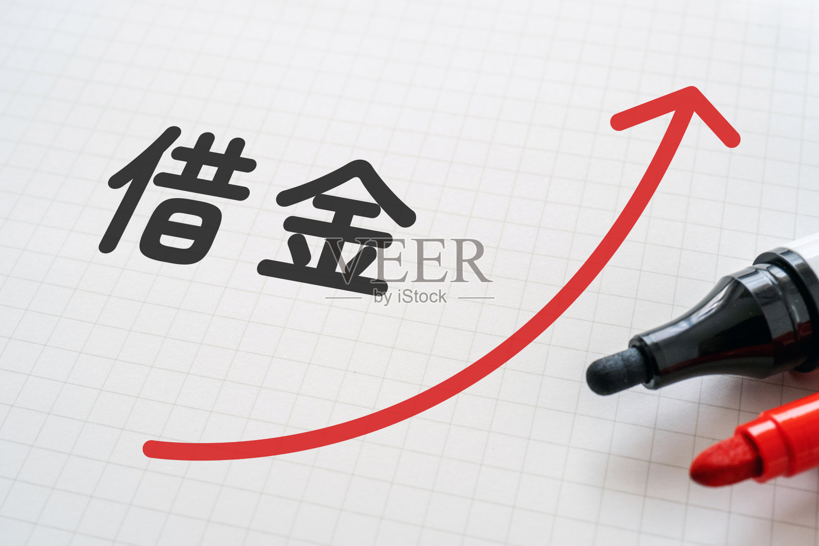 白纸上用记号笔写着“摇晃”。照片摄影图片