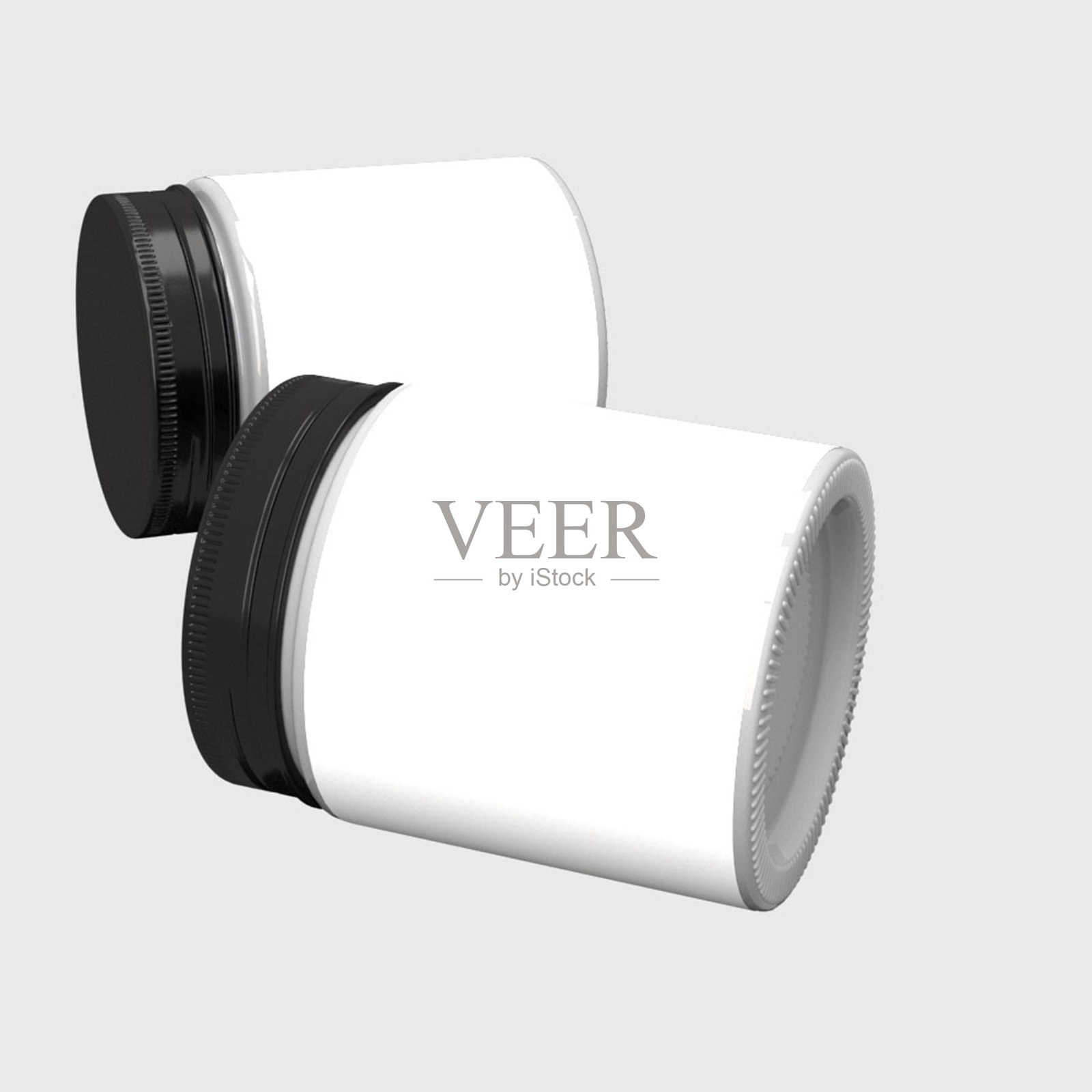 两个放着的罐子，盖着深色的铝盖。近景。白色标签模型。在空白背景上孤立。照片摄影图片