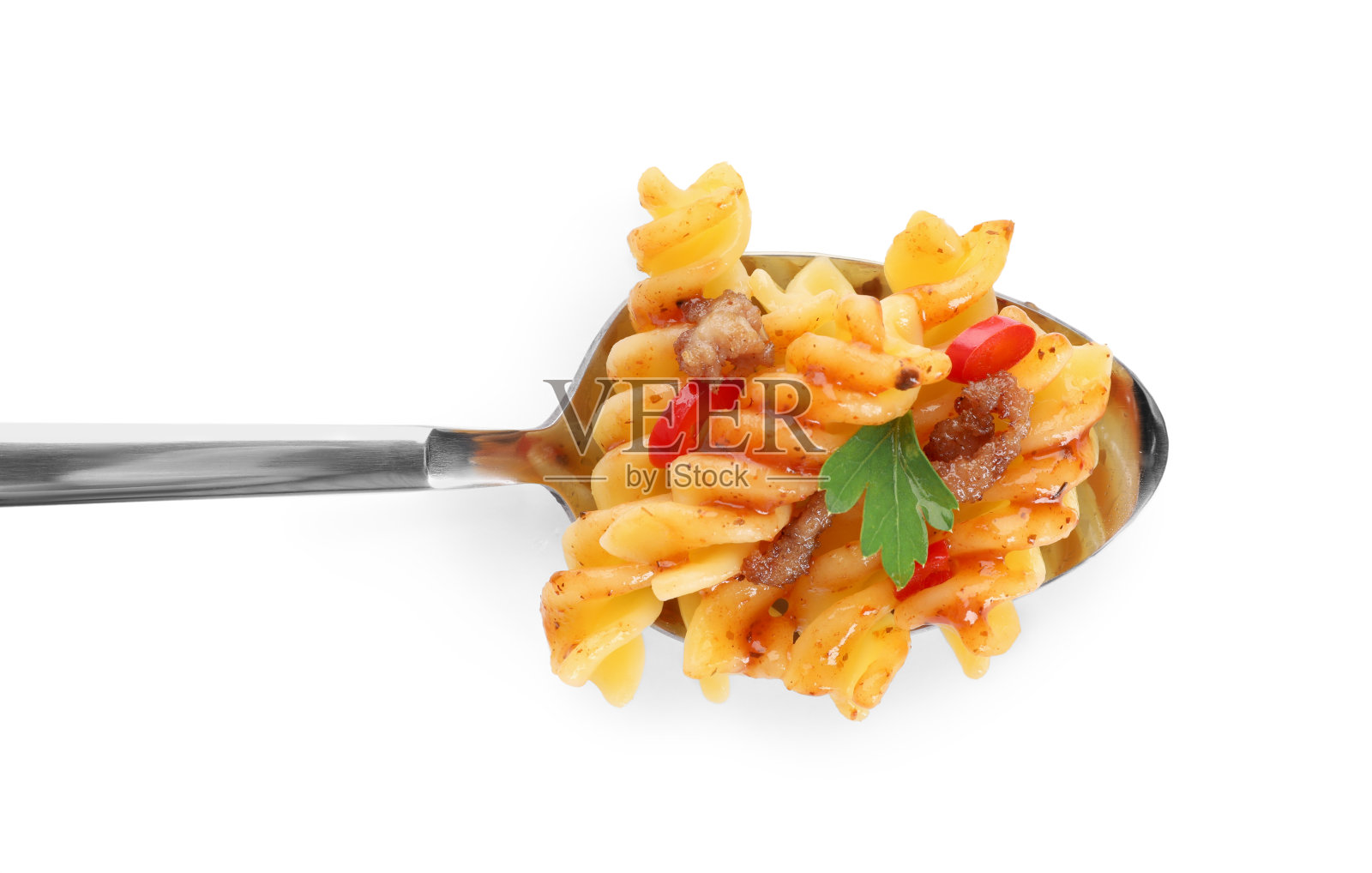 勺子与美味的意大利面隔离在白色，俯视图照片摄影图片