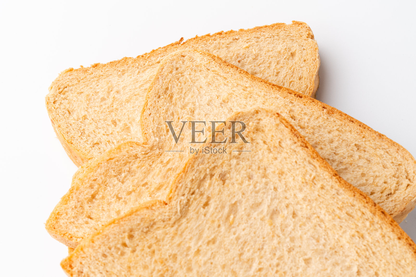 在白色背景上烤面包照片摄影图片