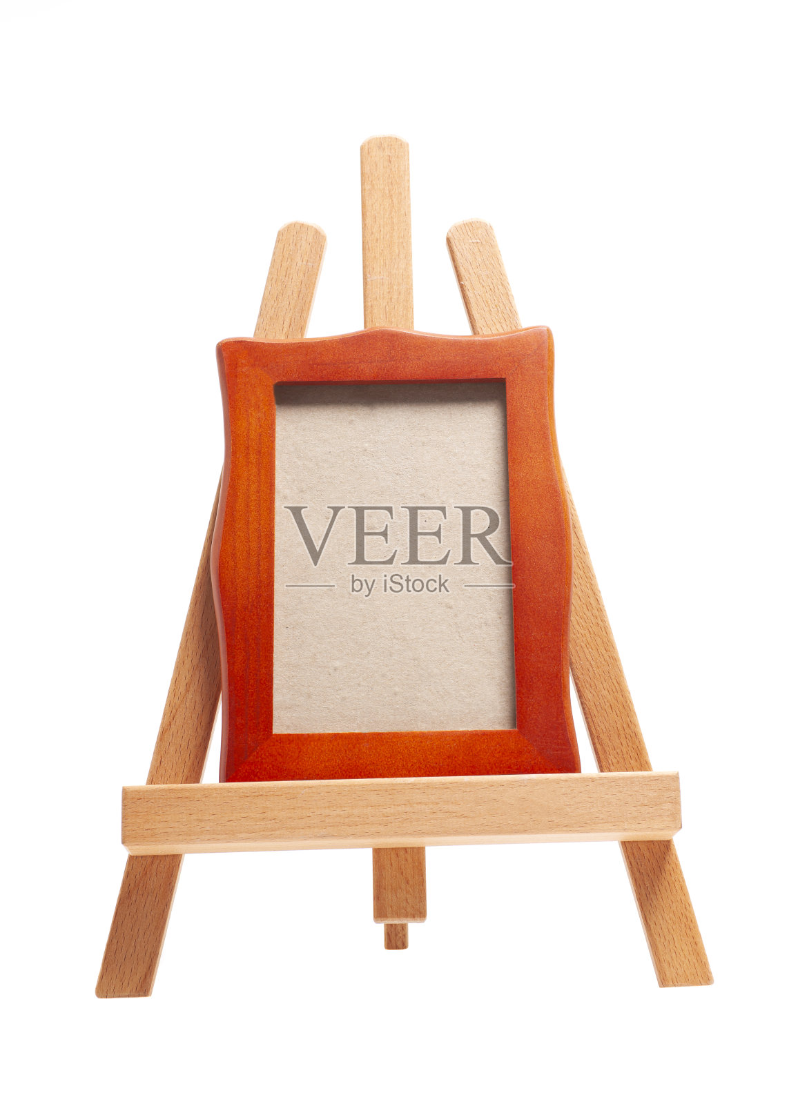 艺术家木制画架与木制空白框架隔离在白色照片摄影图片