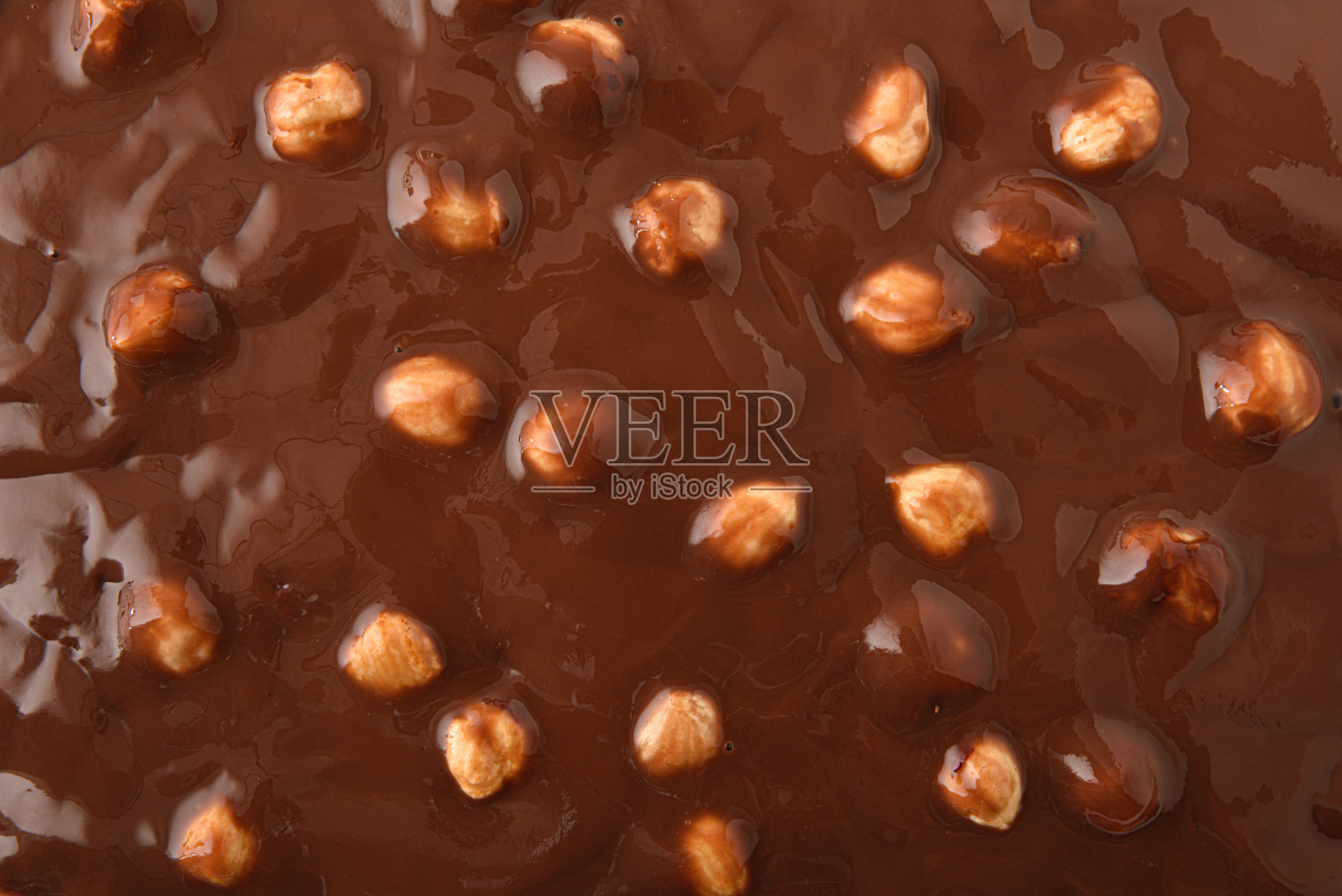 可可奶油质地，上面有榛子照片摄影图片