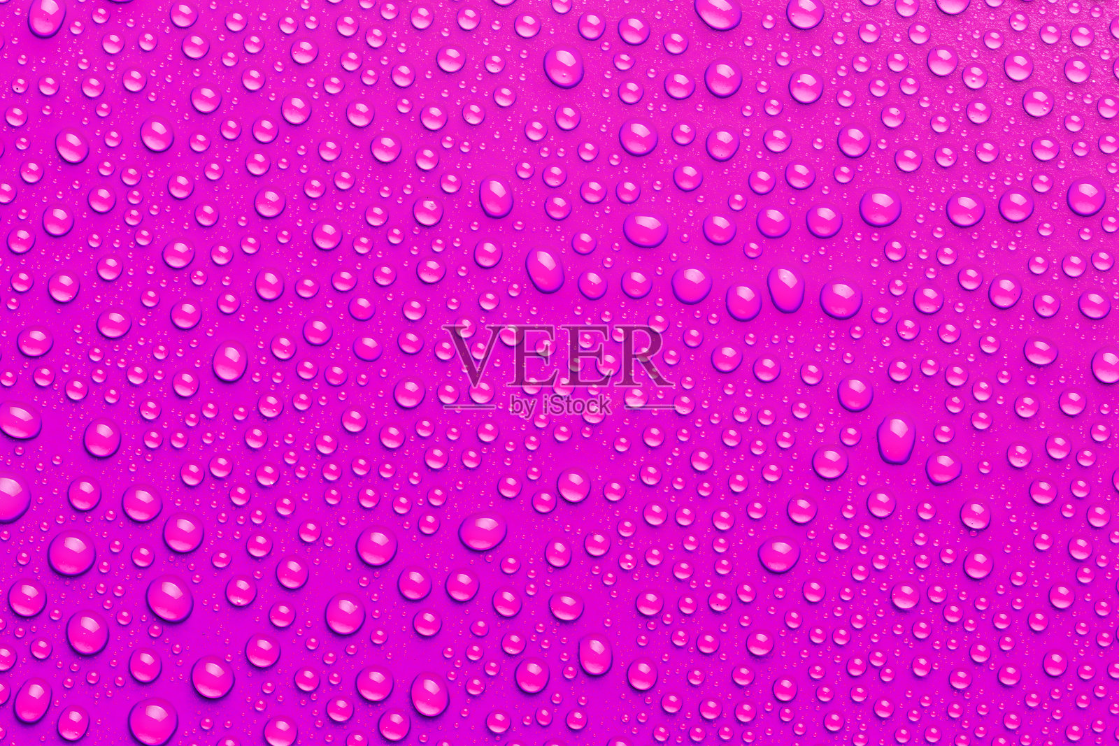 镍品红色水滴背景，俯视图，微距照片摄影图片