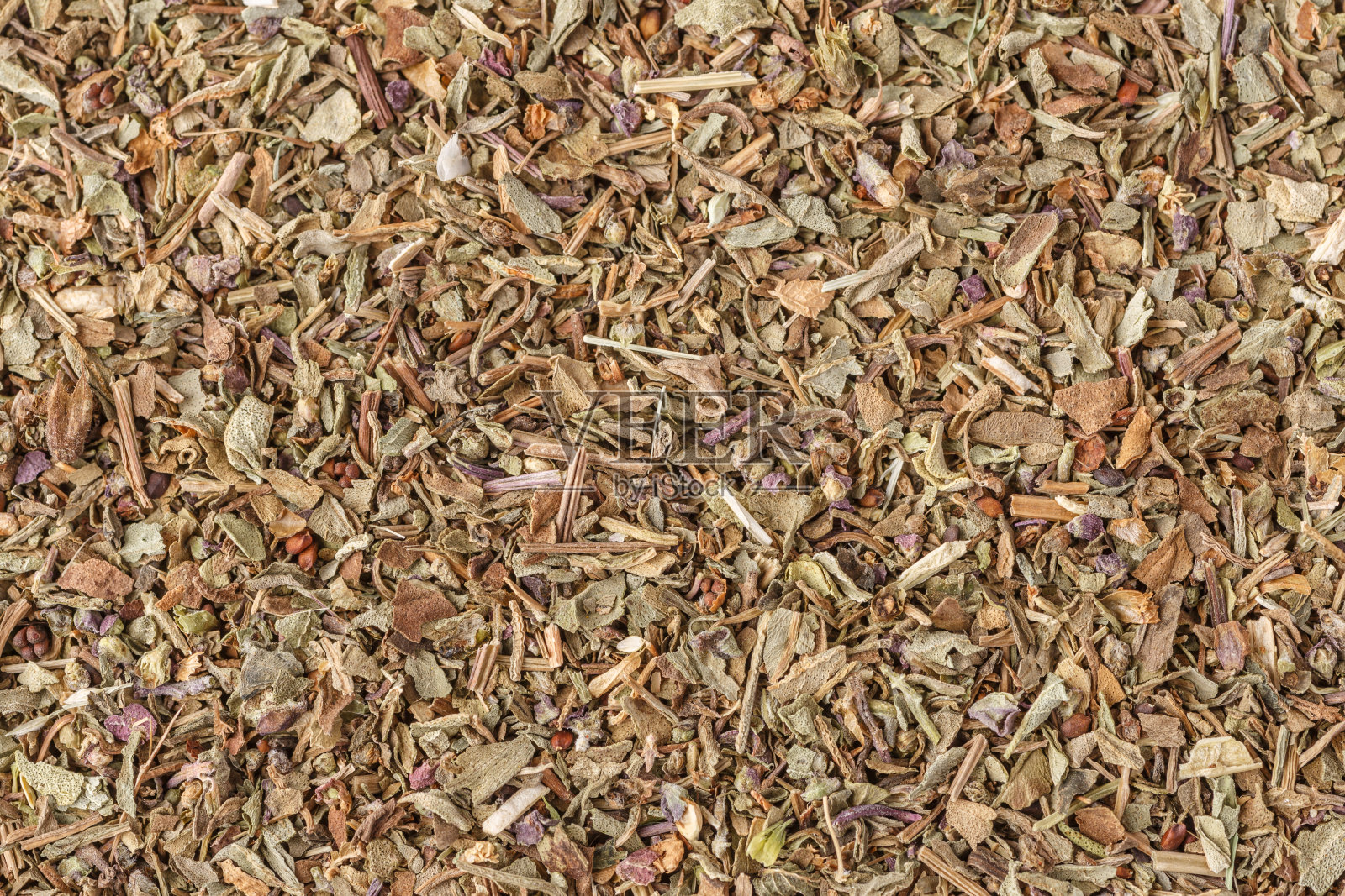 背景由中东传统香料制成。前视图。近距离观察不同香料的混合物。丰富多彩的香料和调味品的质感。照片摄影图片