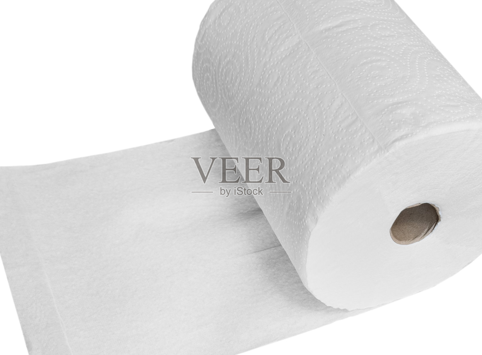 一卷纸巾被隔离在一张白色的桌子上。纸巾。照片摄影图片