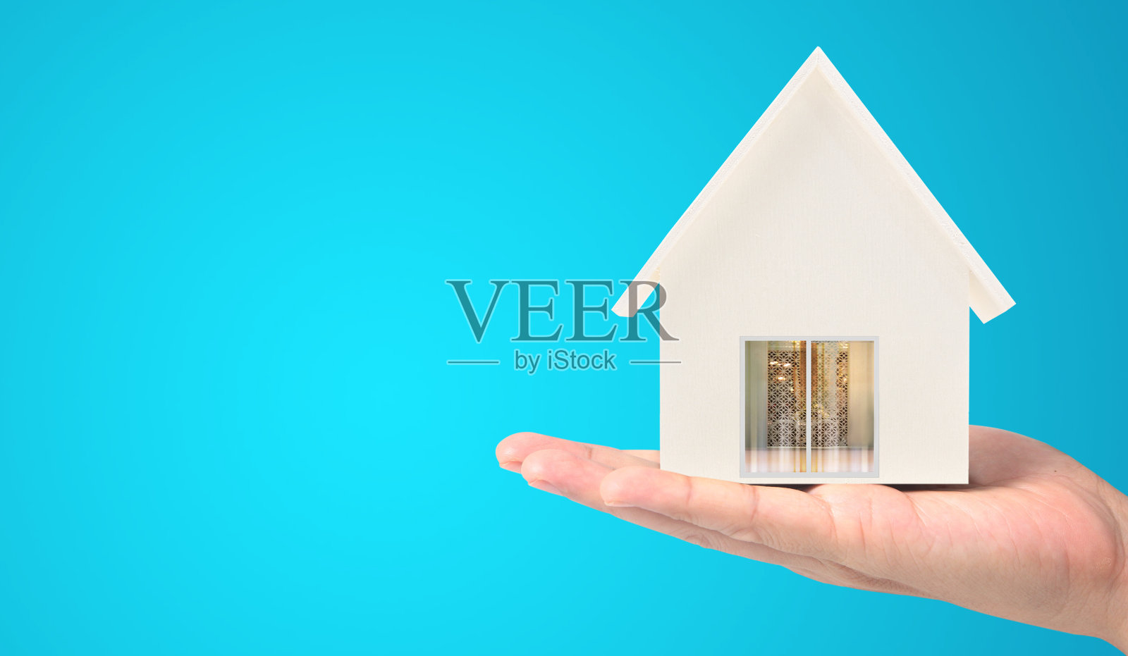 房屋住宅结构在手照片摄影图片