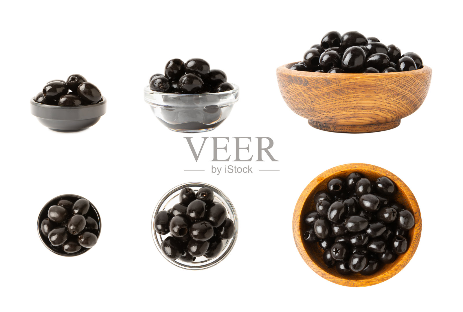 白色背景上孤立的美味橄榄。白色桌子上的橄榄枝和橄榄枝。美味。照片摄影图片