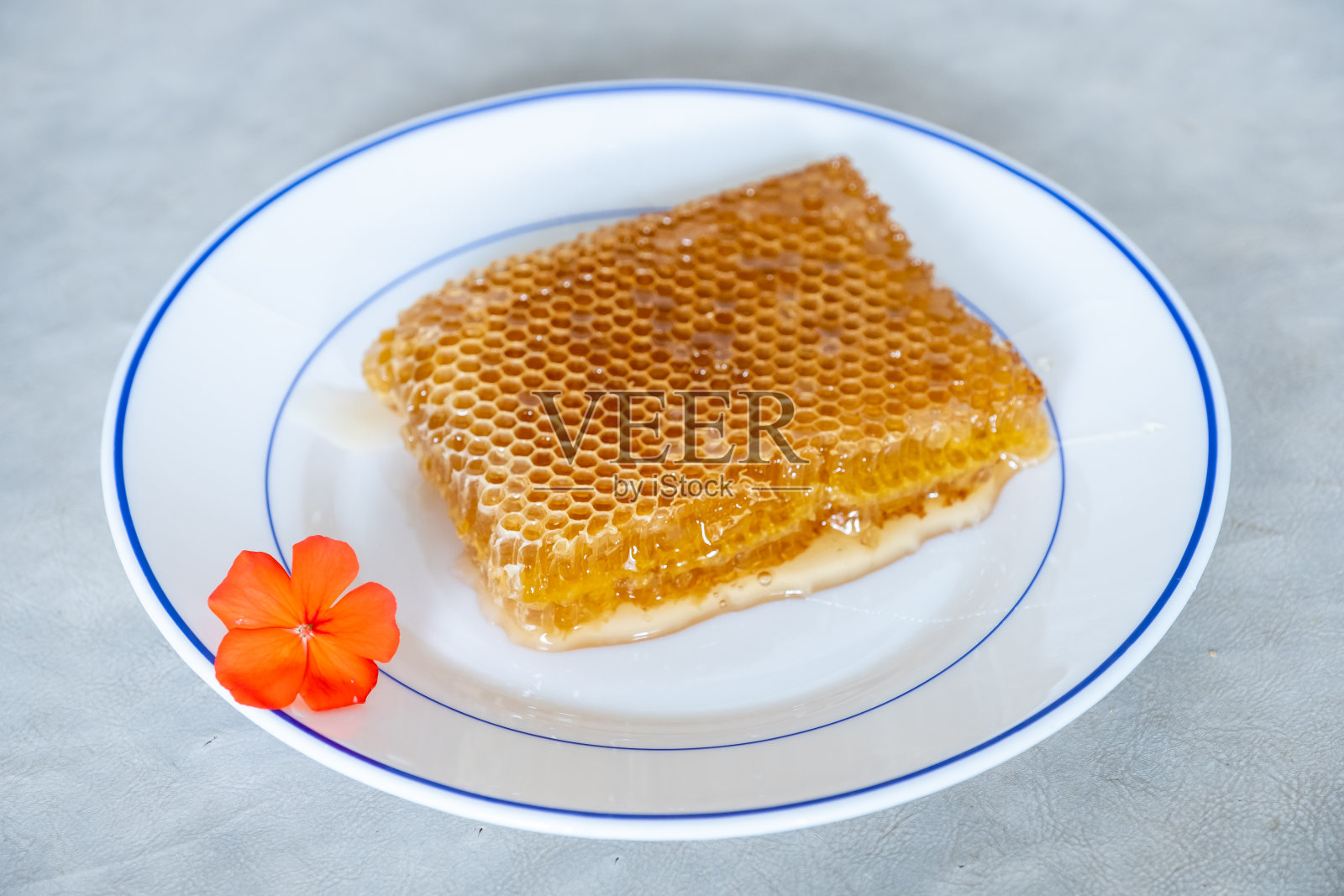 玫瑰柑橘天然蜂蜜照片摄影图片