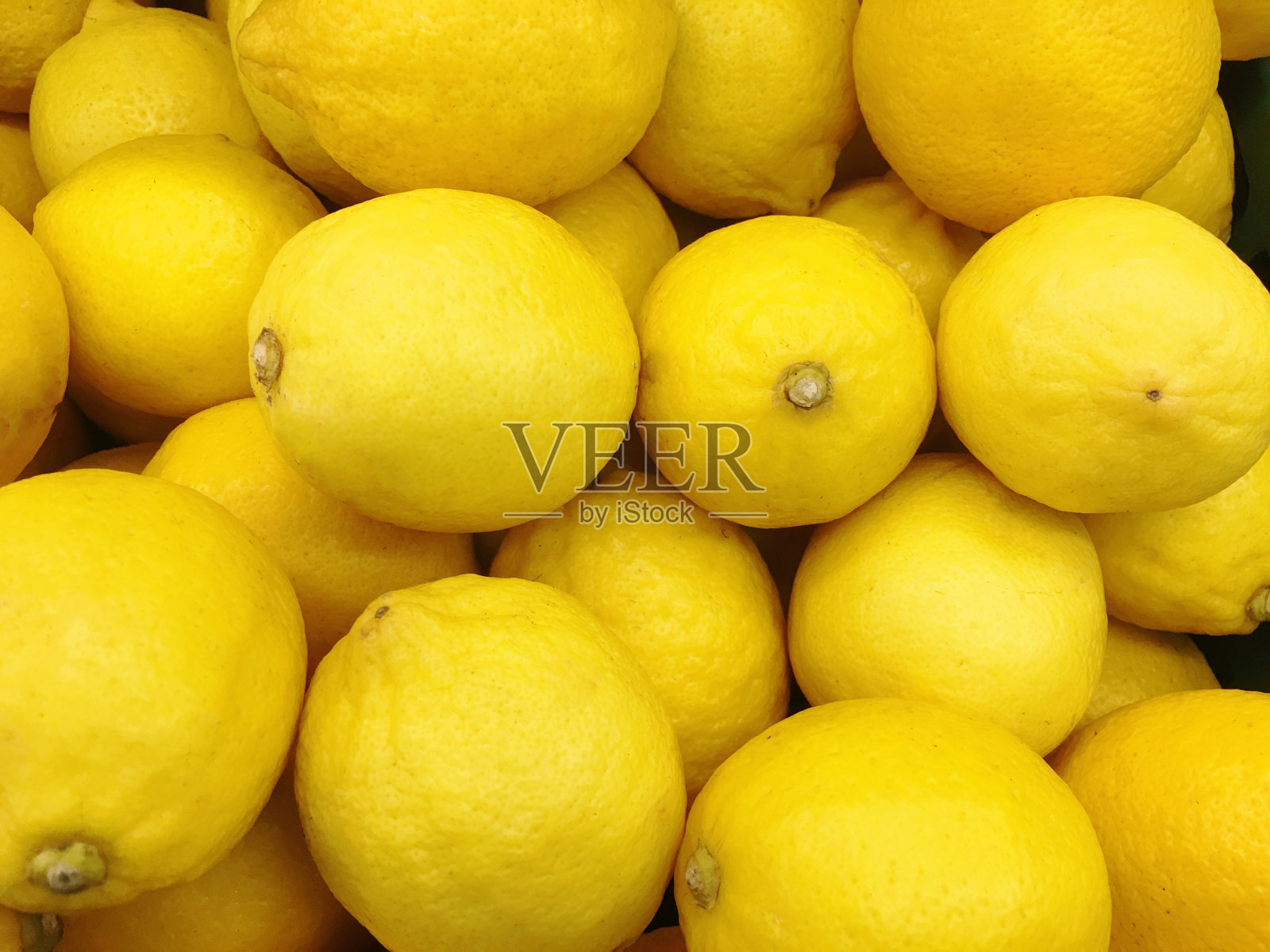 市场上五颜六色的柠檬展示照片摄影图片
