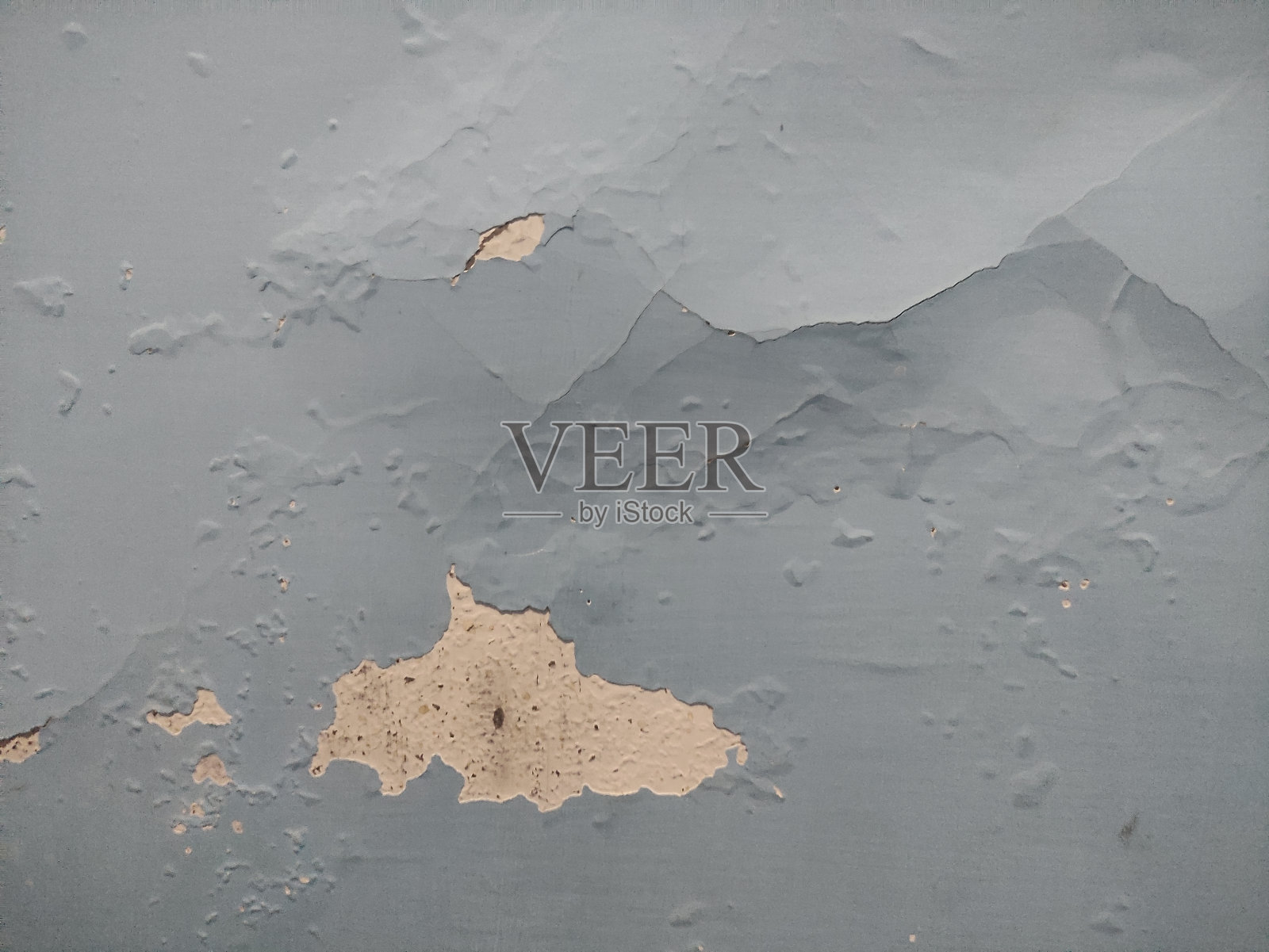 由于天气的原因，墙体的纹理出现了裂痕、开裂和冒泡，需要随着时间的推移进行修复照片摄影图片