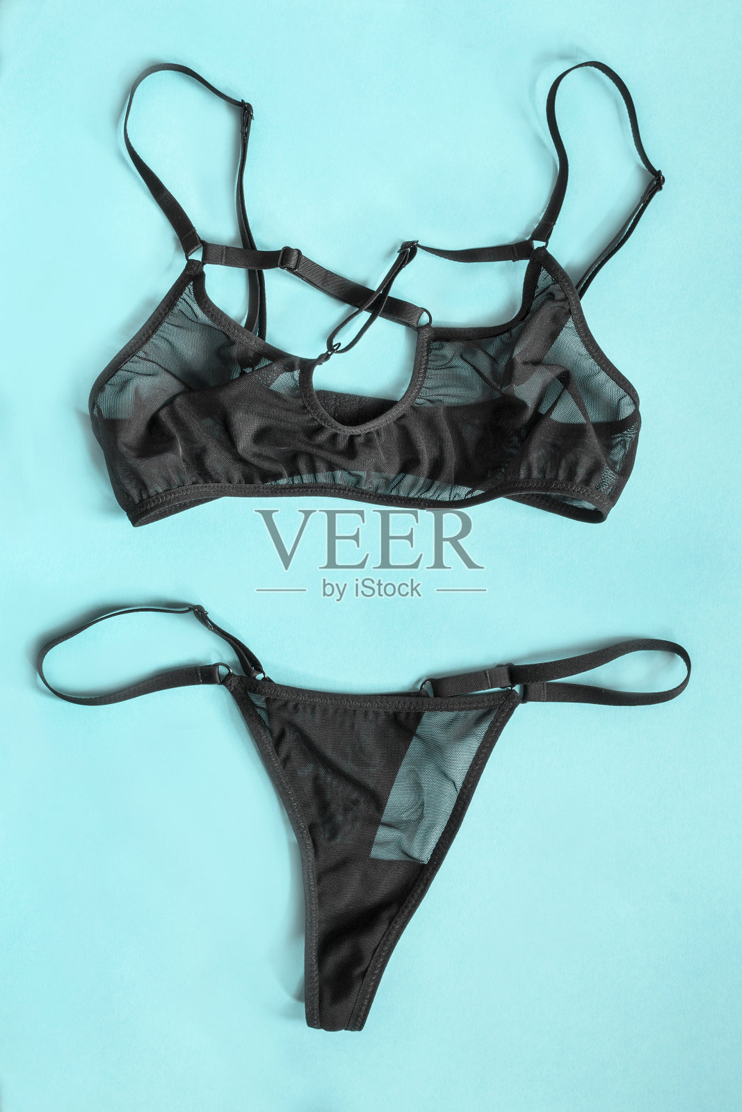 蓝色背景内衣照片摄影图片