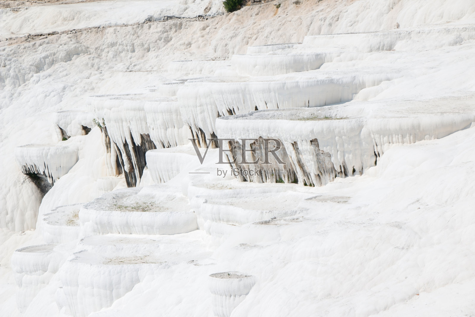 Pamukkale的天然石灰华池和露台。土耳其西南部的棉花城堡照片摄影图片