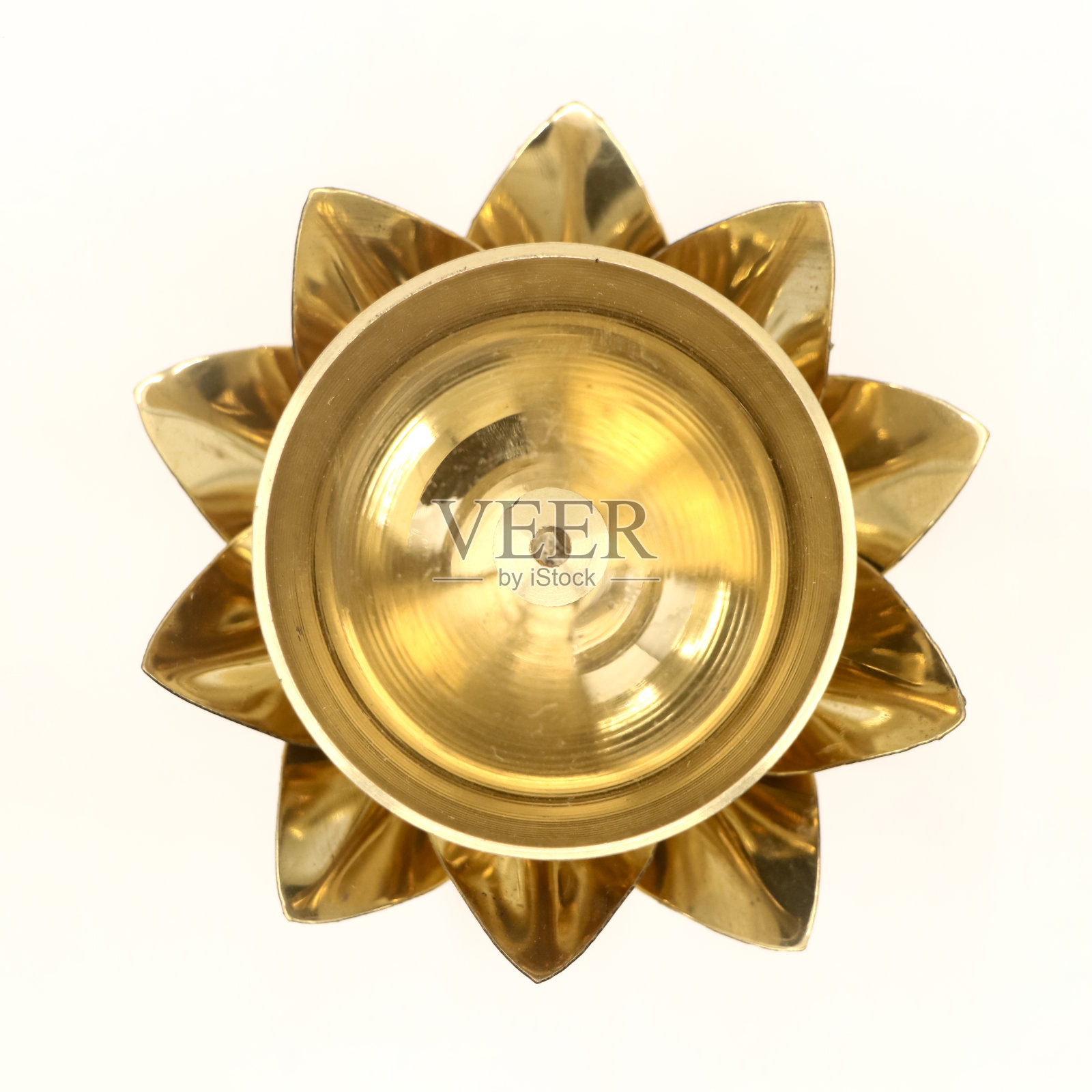 一个古董油芯灯在莲花形状的俯视图照片摄影图片