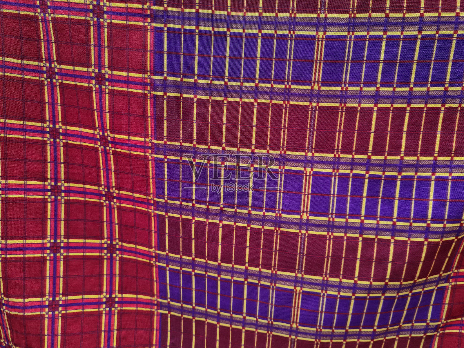 红色和蓝色格子手套背景照片摄影图片