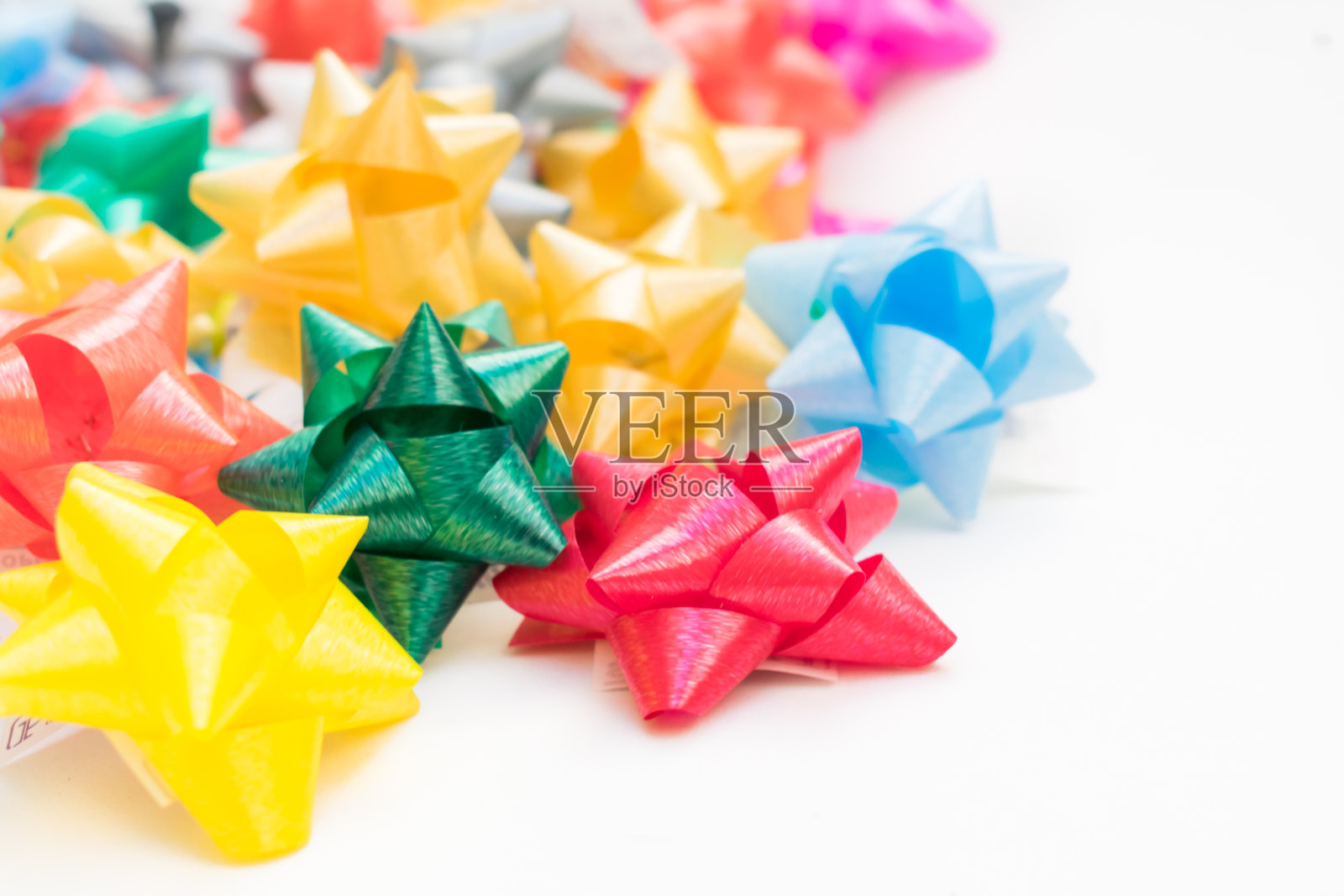 彩色不干胶礼品弓，装饰概念照片摄影图片