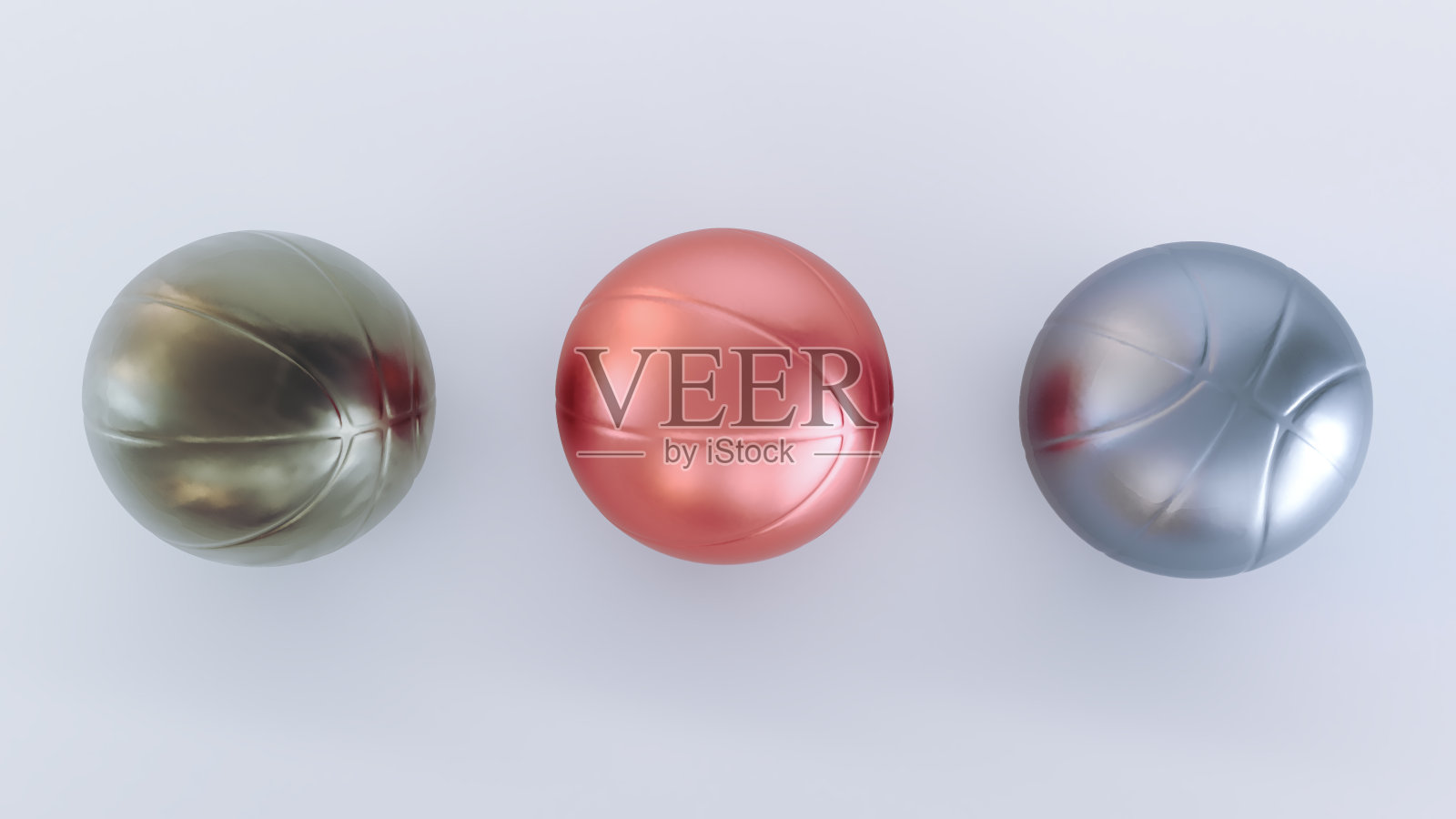 篮球孤立在黑暗的背景，一套金，铜和银篮球在黑色的背景照片摄影图片