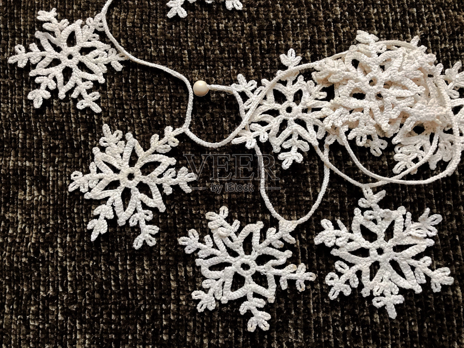 一堆编织的白色雪花照片摄影图片