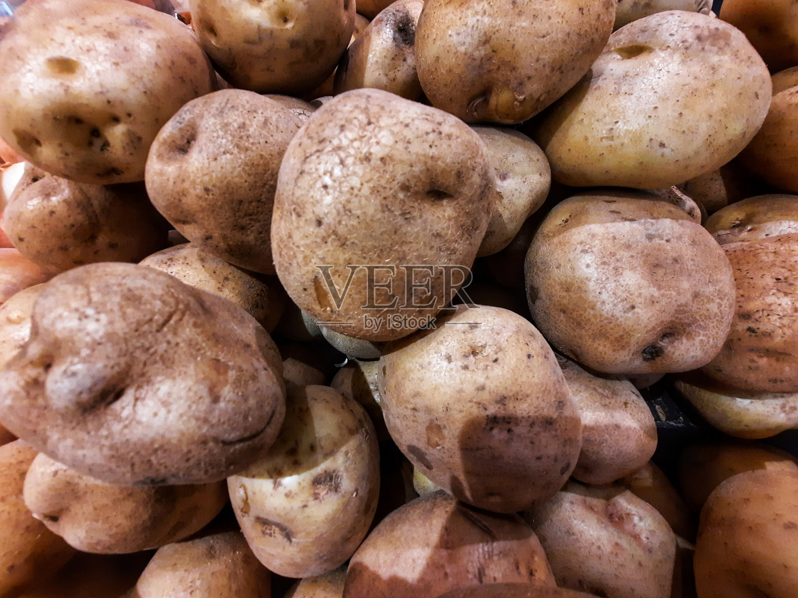 一堆棕色的土豆照片摄影图片