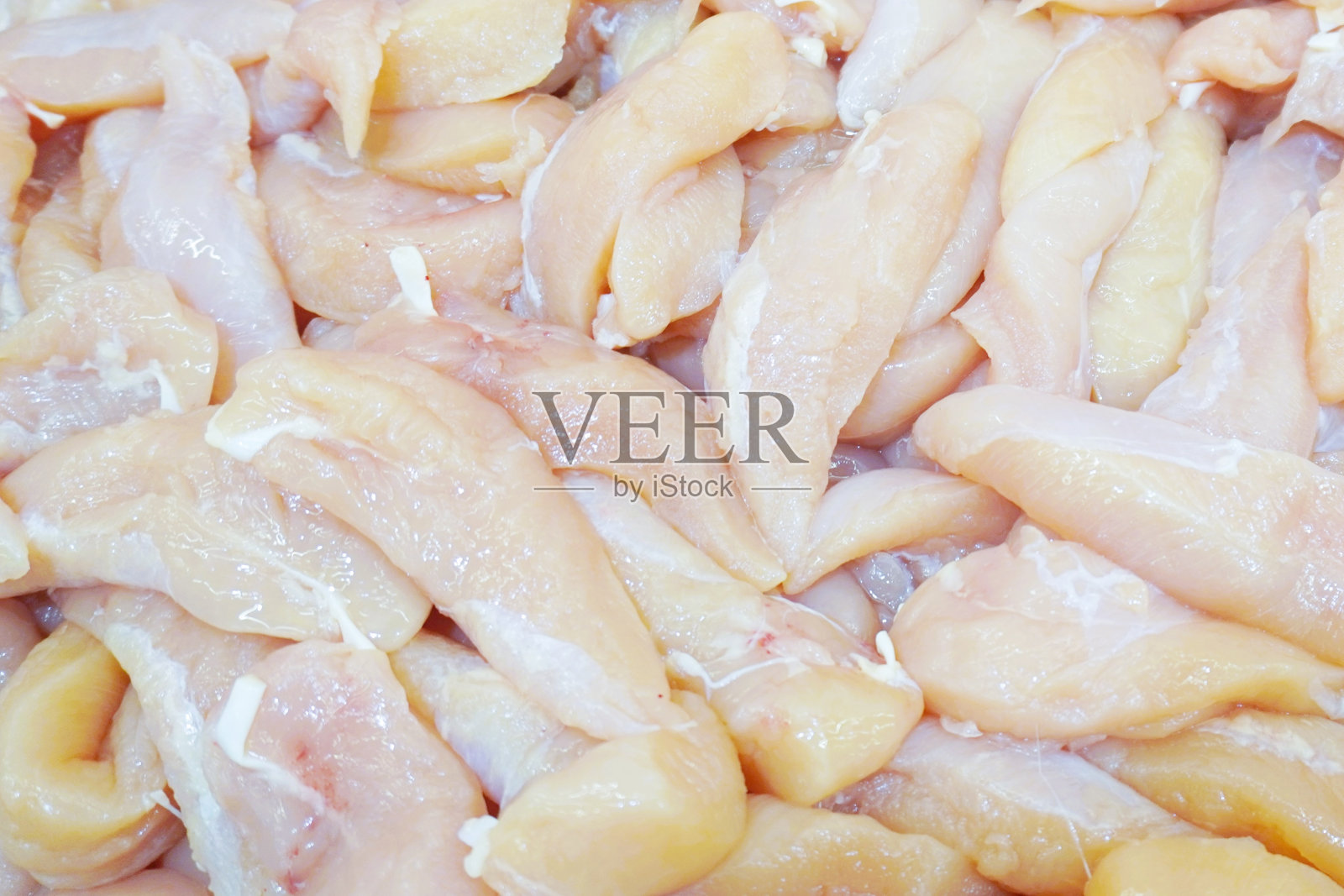 许多鸡胸肉堆在一起待售照片摄影图片