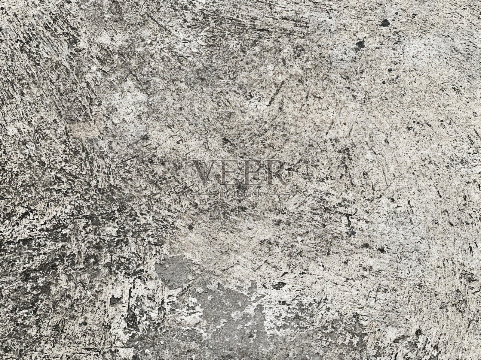 灰白色墙壁，表面粗糙。照片摄影图片