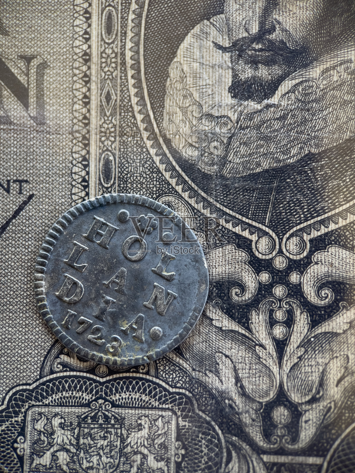 Hollandia硬币和Jan Pieterszoon Coen钞票照片摄影图片