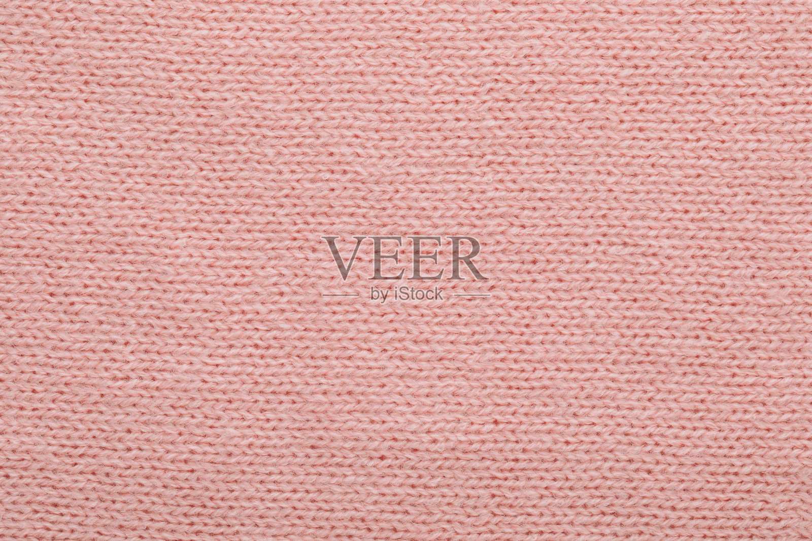 毛衣纹理背景。粉红色针织纹理抽象背景照片摄影图片