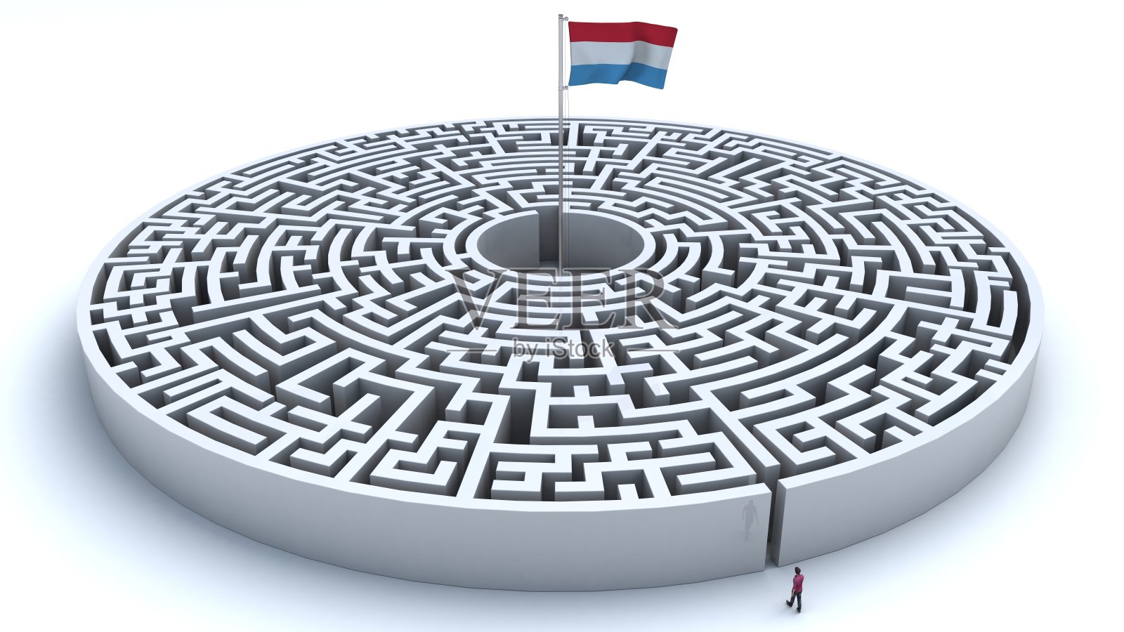 迷宫中央有一面卢森堡国旗，一名男子试图够到它照片摄影图片
