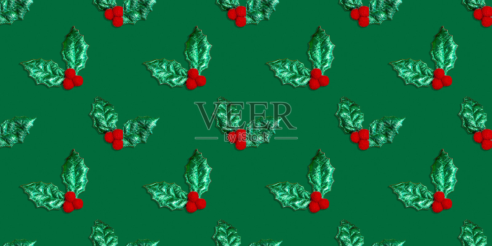 新年和圣诞节无缝图案与树叶和冬青浆果在绿色的背景照片摄影图片