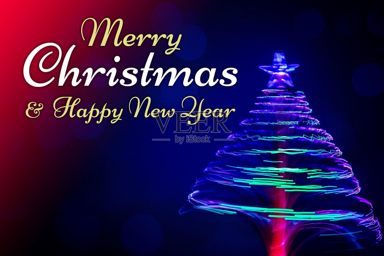 圣诞快乐! !纺纱光纤圣诞树，送上祝福照片摄影图片