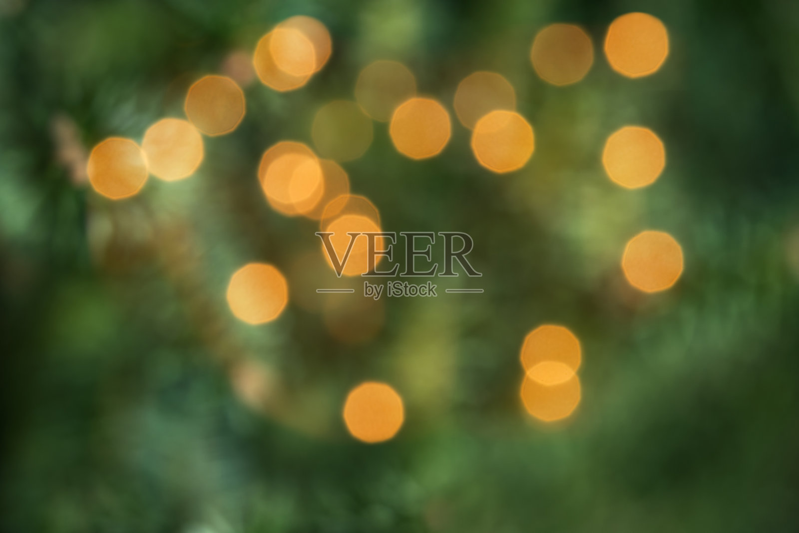 抽象模糊背景。模糊的圣诞树彩灯照片摄影图片