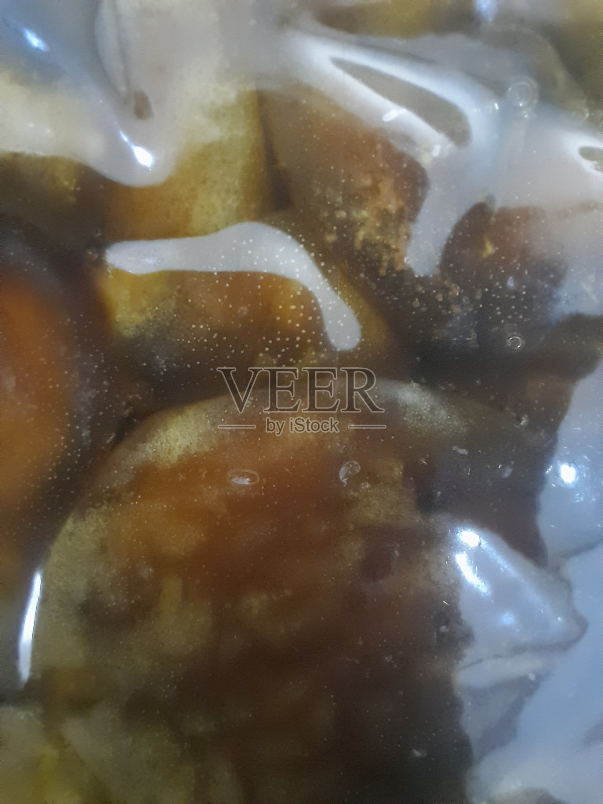 塑料容器中的干枣照片摄影图片