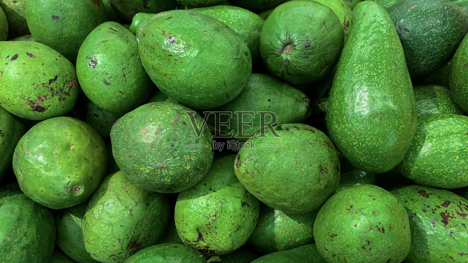 传统市场上的牛油果照片摄影图片