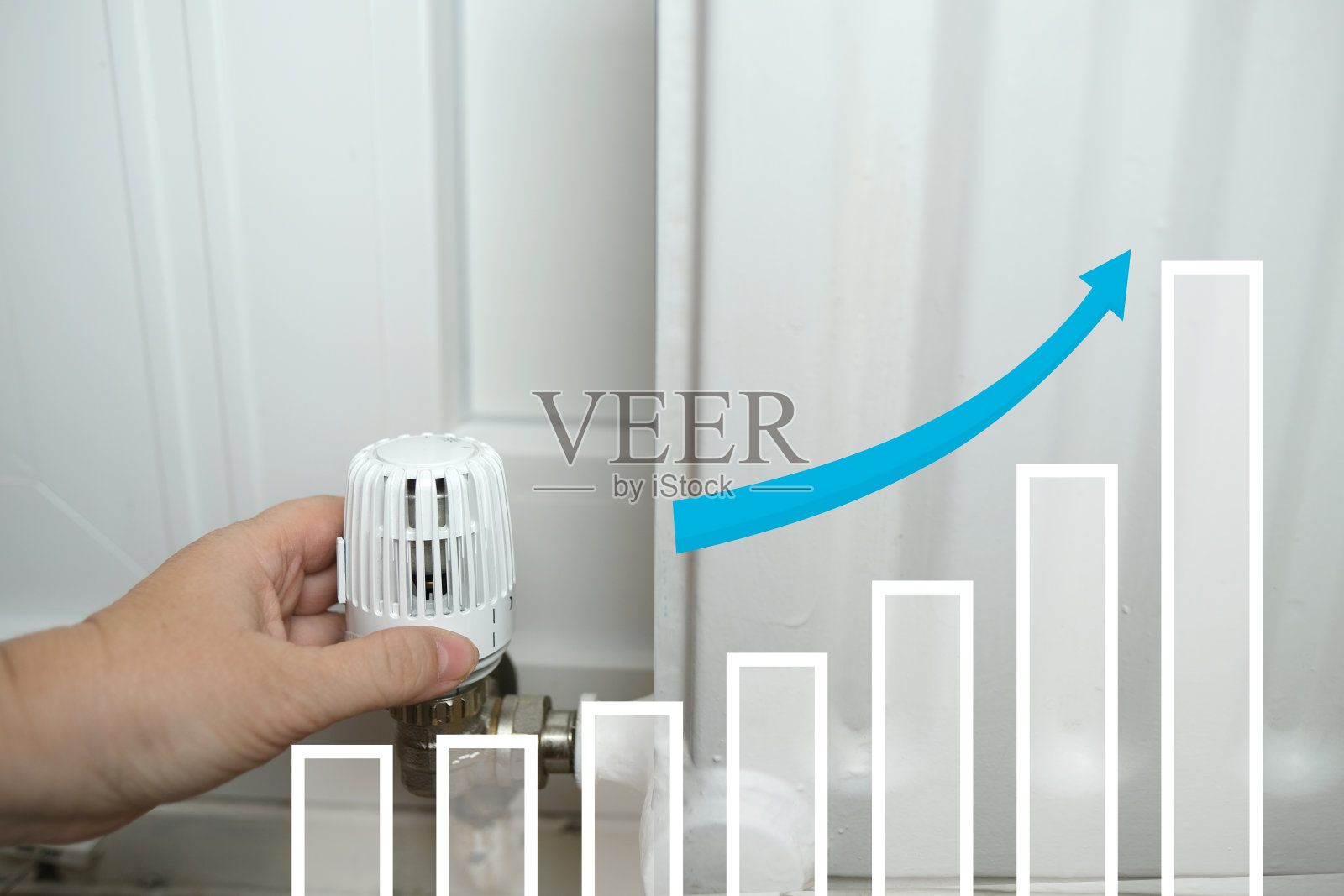 女手转动加热电池上的阀门，增长图形和向上箭头的全息图，发展方向的增长，水电费价格的概念增加照片摄影图片