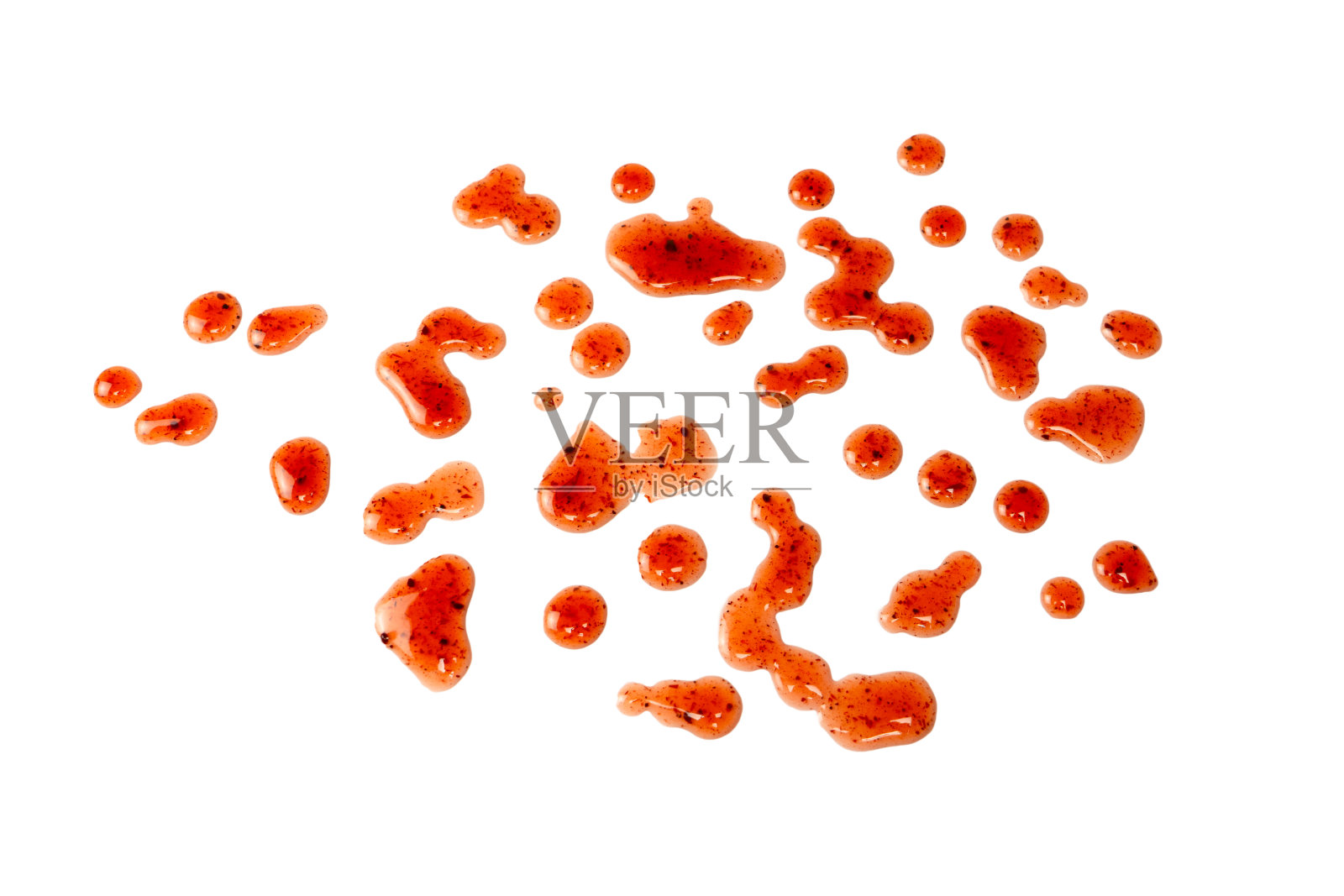 红色的果酱溅在白色的背景上。照片摄影图片