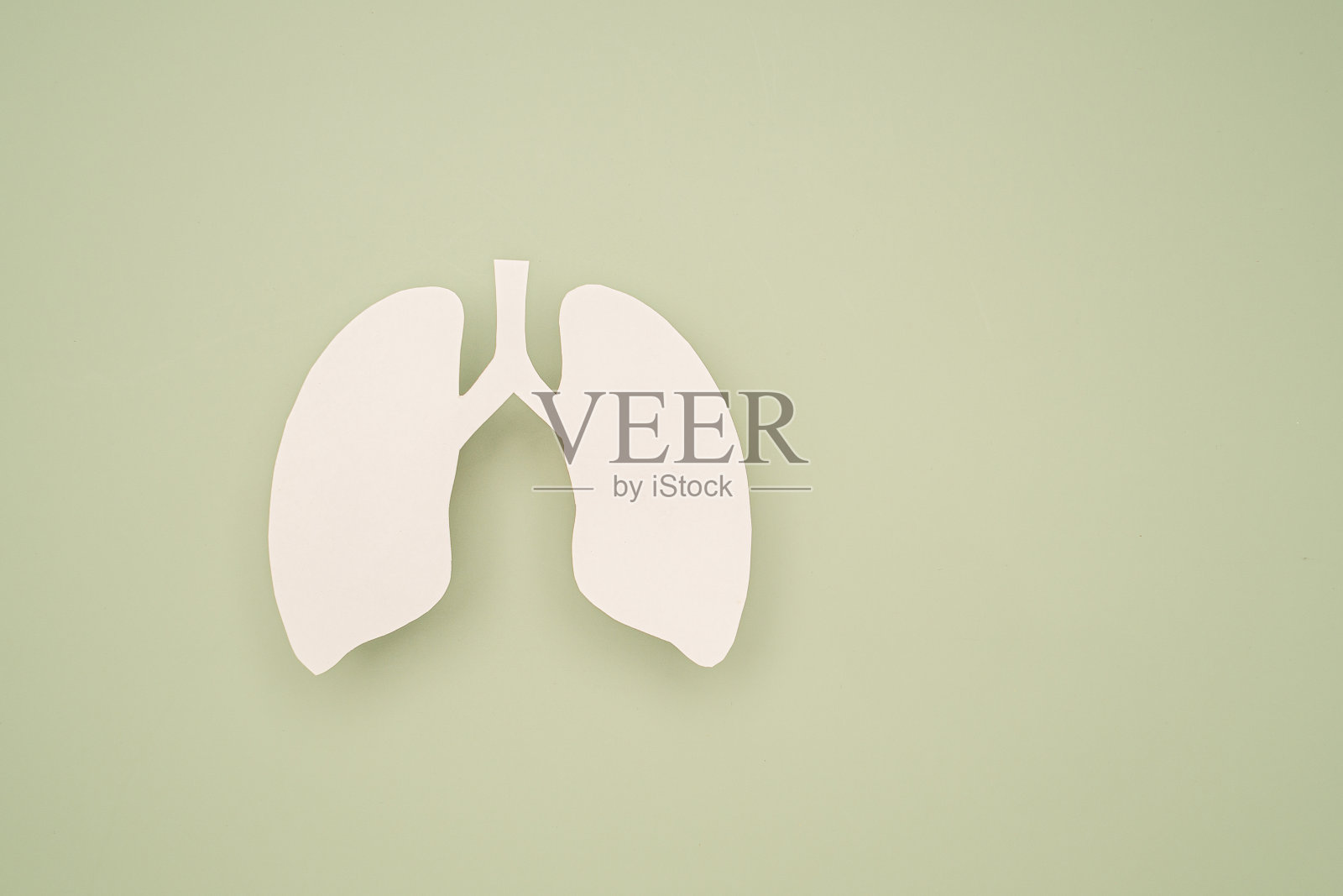 绿色背景上的肺符号，并留有文字空间照片摄影图片