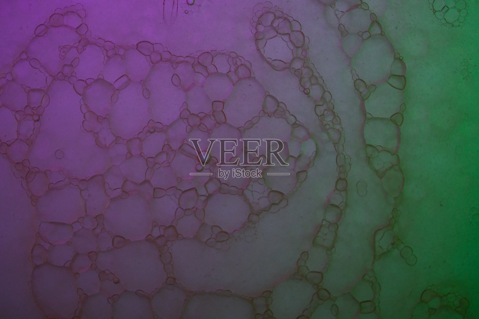 美丽的油泡沫在彩色背景照片摄影图片