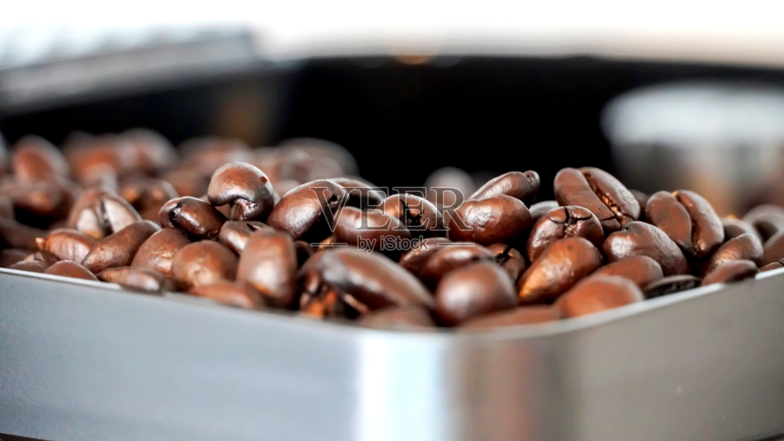 咖啡豆用于浓缩咖啡机照片摄影图片