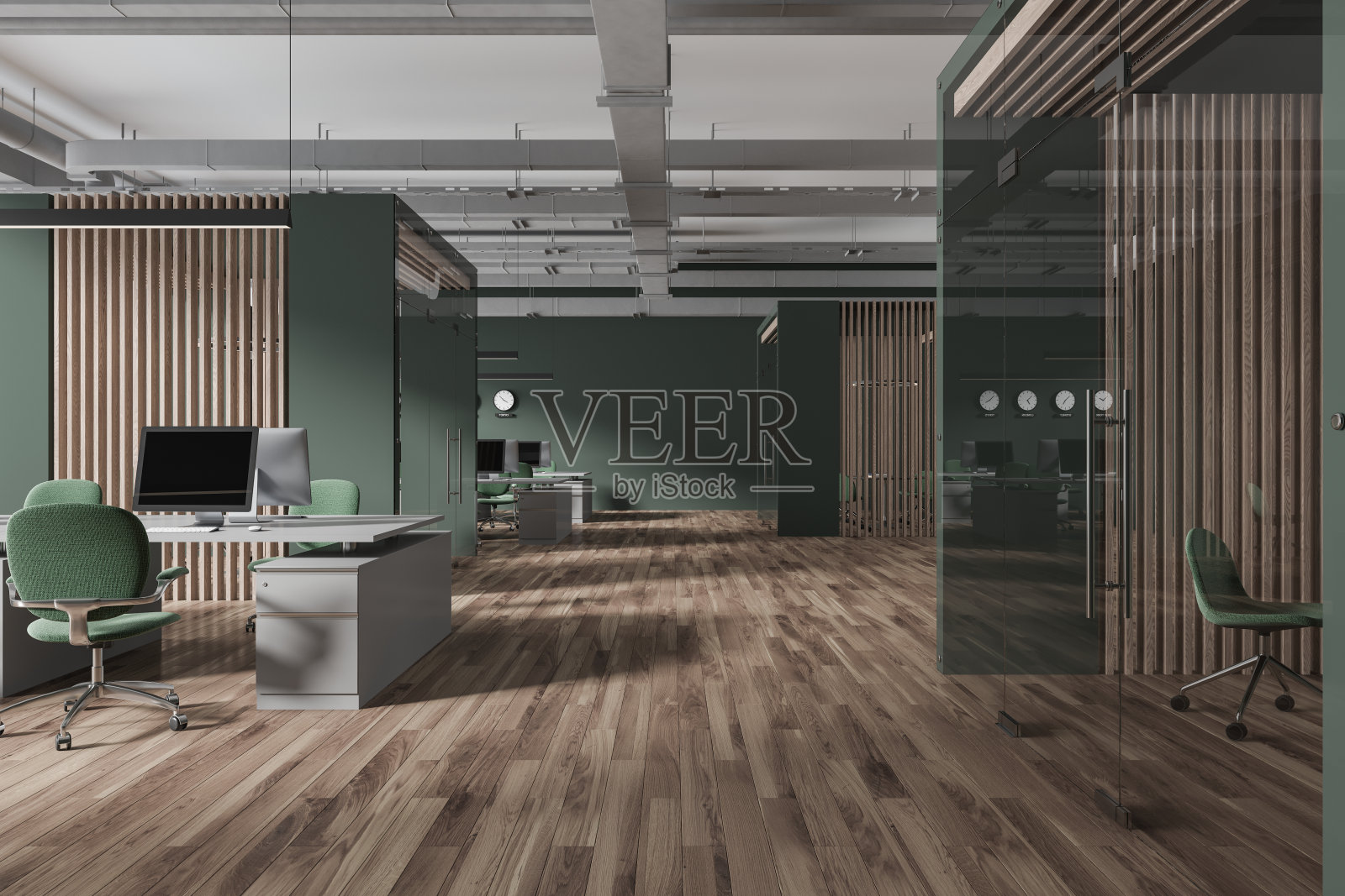 现代化的办公室内部，工作空间，排电脑和玻璃室照片摄影图片