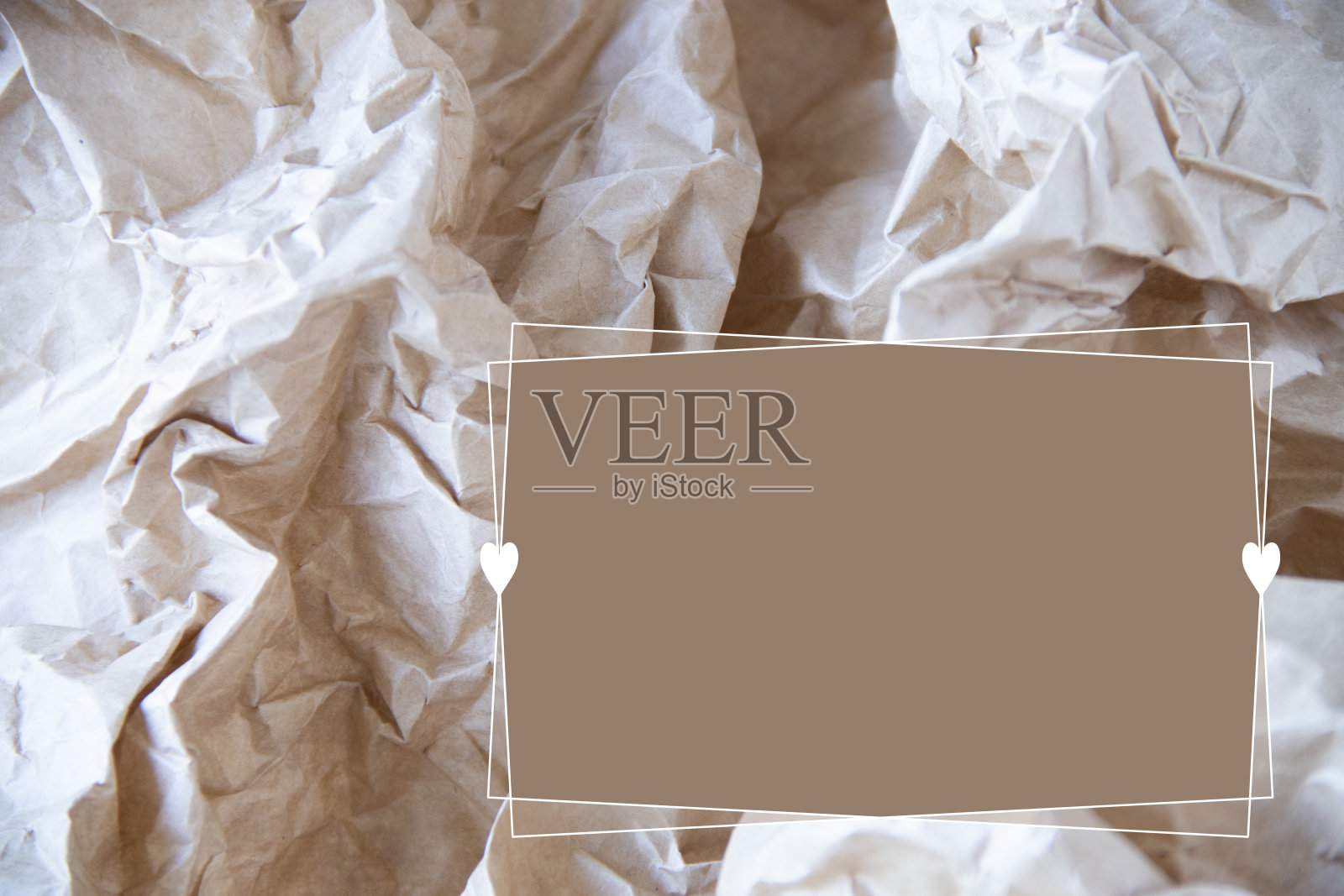 皱巴巴的牛皮纸背景/框架，米色照片摄影图片